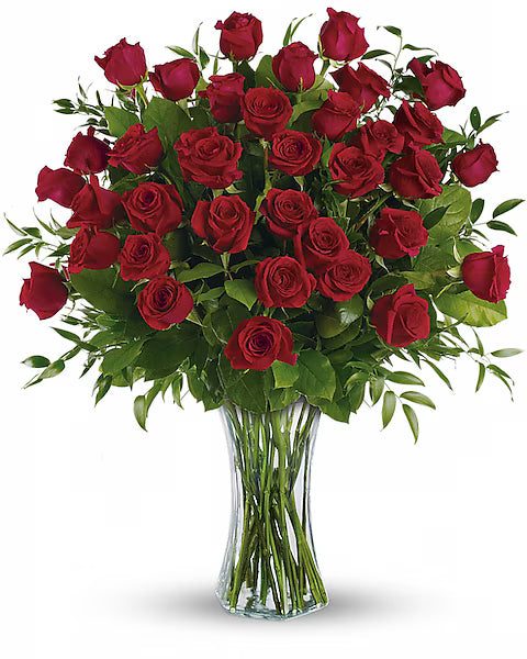 Red roses in a clear vase
