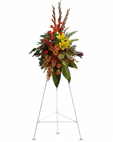 Floral arrangement on a stand with a white background