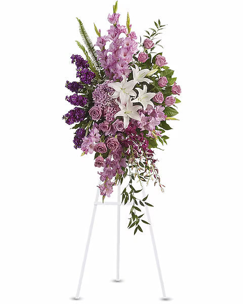 Colorful flowers on a stand with purple, pink, and white flowers