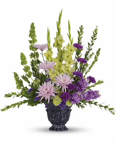 Decorative vase with elegant purple, green, and white floral arrangement